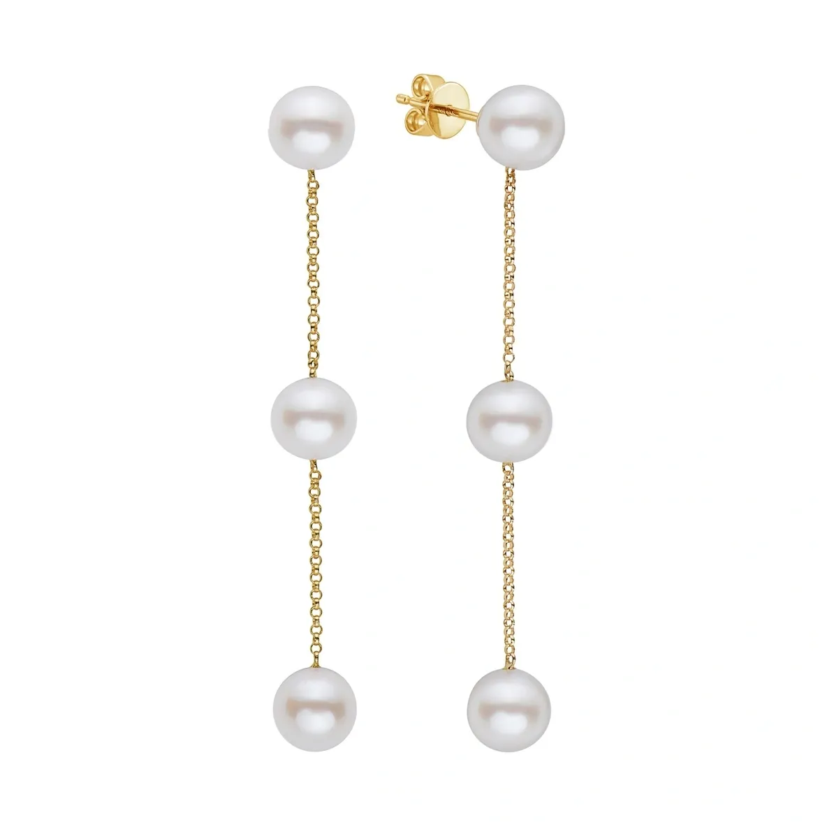 A pair of gold earrings with pearls hanging from them.